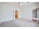 Large bedroom with a ceiling fan and carpet at 2324 Willow Wren Dr, North Las Vegas, NV 89084