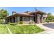 Exterior of clubhouse with stone accents and well-maintained landscaping at 2324 Willow Wren Dr, North Las Vegas, NV 89084