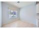 Charming dining area with natural light and neutral tile flooring at 2324 Willow Wren Dr, North Las Vegas, NV 89084