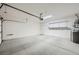 Spacious two car garage with overhead lights and room for storage at 2324 Willow Wren Dr, North Las Vegas, NV 89084