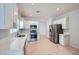 Kitchen with white cabinets, stainless steel appliances, and tile floors at 2324 Willow Wren Dr, North Las Vegas, NV 89084