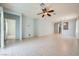 Spacious living room boasting tile flooring and modern fixtures, providing a comfortable and open layout at 2324 Willow Wren Dr, North Las Vegas, NV 89084
