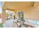 Comfortable covered patio featuring stylish outdoor seating at 2324 Willow Wren Dr, North Las Vegas, NV 89084