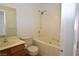 This bathroom features a tub and shower combo, a sink and vanity, and a toilet at 2431 Old Forge Ln # 101, Las Vegas, NV 89121