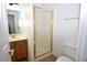 This bathroom has a vanity, shower, and toilet at 2431 Old Forge Ln # 101, Las Vegas, NV 89121