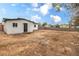 Large backyard with block wall and small building perfect for outdoor activities at 2621 Bello Dr, North Las Vegas, NV 89030