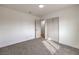 Carpeted bedroom with recessed lighting, closet, and a door that leads to another room at 2621 Bello Dr, North Las Vegas, NV 89030