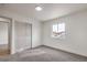 Bright bedroom with carpet, closet and a window allowing for plenty of natural light at 2621 Bello Dr, North Las Vegas, NV 89030
