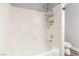 Bright bathroom showcasing a tiled shower and a modern shower head at 2842 Mahogany Grove Ave, Henderson, NV 89074