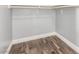 Walk in closet with painted walls and wood floor at 2842 Mahogany Grove Ave, Henderson, NV 89074