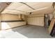 Spacious garage with ample storage cabinets and epoxy flooring at 2842 Mahogany Grove Ave, Henderson, NV 89074