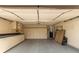 Spacious garage with ample storage cabinets and epoxy flooring at 2842 Mahogany Grove Ave, Henderson, NV 89074
