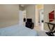 This bedroom has neutral paint and carpet, with hall access to other rooms at 2913 Grande Arch St, Henderson, NV 89044