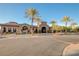 Exterior view of the community clubhouse, showcasing its welcoming entrance and landscaping at 2913 Grande Arch St, Henderson, NV 89044