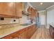 Gourmet kitchen with granite countertops, stainless steel appliances, and custom cabinetry for culinary enthusiasts at 2913 Grande Arch St, Henderson, NV 89044