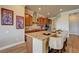 Spacious kitchen features granite countertops, stainless steel appliances, and a breakfast bar with seating at 2913 Grande Arch St, Henderson, NV 89044