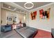 Open-concept living room with stylish decor, seamless flow, and connecting rooms for easy entertaining at 2913 Grande Arch St, Henderson, NV 89044