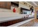 Stylish living room includes a floating entertainment center and modern decor at 2913 Grande Arch St, Henderson, NV 89044