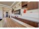 Elegant living room featuring a custom entertainment center and hardwood floors at 2913 Grande Arch St, Henderson, NV 89044