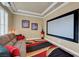 Cozy media room with a large screen, comfortable seating, and stylish decor, perfect for movie nights at 2913 Grande Arch St, Henderson, NV 89044
