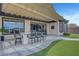 Built in outdoor kitchen features a granite countertop bar, stainless steel grill, and mountain views at 2913 Grande Arch St, Henderson, NV 89044