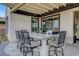 Built in outdoor kitchen features a granite countertop bar, stainless steel grill and mountain views at 2913 Grande Arch St, Henderson, NV 89044