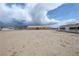 Large lot featuring a ranch-style home and ample open space at 3110 National Ave, Pahrump, NV 89048