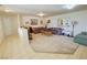 Spacious living room features neutral walls, plush carpeting and recessed lighting at 3110 National Ave, Pahrump, NV 89048