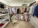 Well-organized walk-in closet with ample shelving and hanging space for easy storage at 3110 National Ave, Pahrump, NV 89048