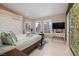 Bright bedroom featuring white floors, multiple windows, and neutral decor at 3240 W Richmar Ave, Las Vegas, NV 89139