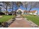 Charming single-story home with a welcoming front porch, manicured lawn, and well-maintained landscaping at 3240 W Richmar Ave, Las Vegas, NV 89139