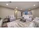 Inviting living room with plush sofas, stylish decor, and a neutral color palette that creates a relaxing atmosphere at 3240 W Richmar Ave, Las Vegas, NV 89139