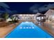 Stunning backyard pool with elegant seating area perfect for evening entertaining, set against a modern home exterior at 3240 W Richmar Ave, Las Vegas, NV 89139