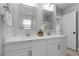 Modern bathroom with double vanity, white countertops, and stylish fixtures at 3268 Grayson Lake Ct, Las Vegas, NV 89129