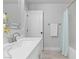 Well lit bathroom featuring a shower/tub combo with white tiling and a neutral shower curtain at 3268 Grayson Lake Ct, Las Vegas, NV 89129
