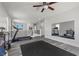 Versatile bonus room equipped with exercise equipment and a full-length mirror, perfect for a home gym at 3268 Grayson Lake Ct, Las Vegas, NV 89129