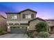Charming two-story home with a well-manicured yard and a convenient two-car garage at 3268 Grayson Lake Ct, Las Vegas, NV 89129