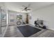 Upstairs loft area with exercise equipment, large mirror, and natural lighting at 3268 Grayson Lake Ct, Las Vegas, NV 89129