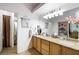 Bright bathroom featuring double sinks and vanity with a view to the bedroom at 36 Trailside Ct, Henderson, NV 89012