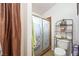 Bathroom featuring toilet, shower and decorative glass doors at 36 Trailside Ct, Henderson, NV 89012