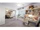Cozy bedroom with mirrored closet, a desk and shelves, and carpeted flooring at 36 Trailside Ct, Henderson, NV 89012
