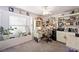 Bedroom with window, ceiling fan, desk, shelving and office chair at 36 Trailside Ct, Henderson, NV 89012