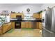 Spacious kitchen with granite countertops and stainless steel appliances at 36 Trailside Ct, Henderson, NV 89012