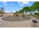 Community playground featuring swings, slides, and climbing structures in a safe environment at 36 Trailside Ct, Henderson, NV 89012