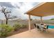 Outdoor patio with table, chairs, and beautiful swimming pool at 4417 Gracemont Ave, Las Vegas, NV 89139