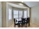 Charming dining nook with shuttered windows and seating for four at 4417 Gracemont Ave, Las Vegas, NV 89139