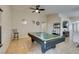 Bright game room featuring a pool table, ceiling fan, and neutral decor at 4417 Gracemont Ave, Las Vegas, NV 89139