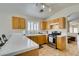 Bright open kitchen with stainless appliances and access to Gathering room at 4417 Gracemont Ave, Las Vegas, NV 89139