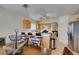 Bright open kitchen with bar seating and view to billiard room at 4417 Gracemont Ave, Las Vegas, NV 89139