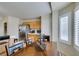 Open kitchen and dining area with stainless steel appliances and oak cabinets at 4417 Gracemont Ave, Las Vegas, NV 89139